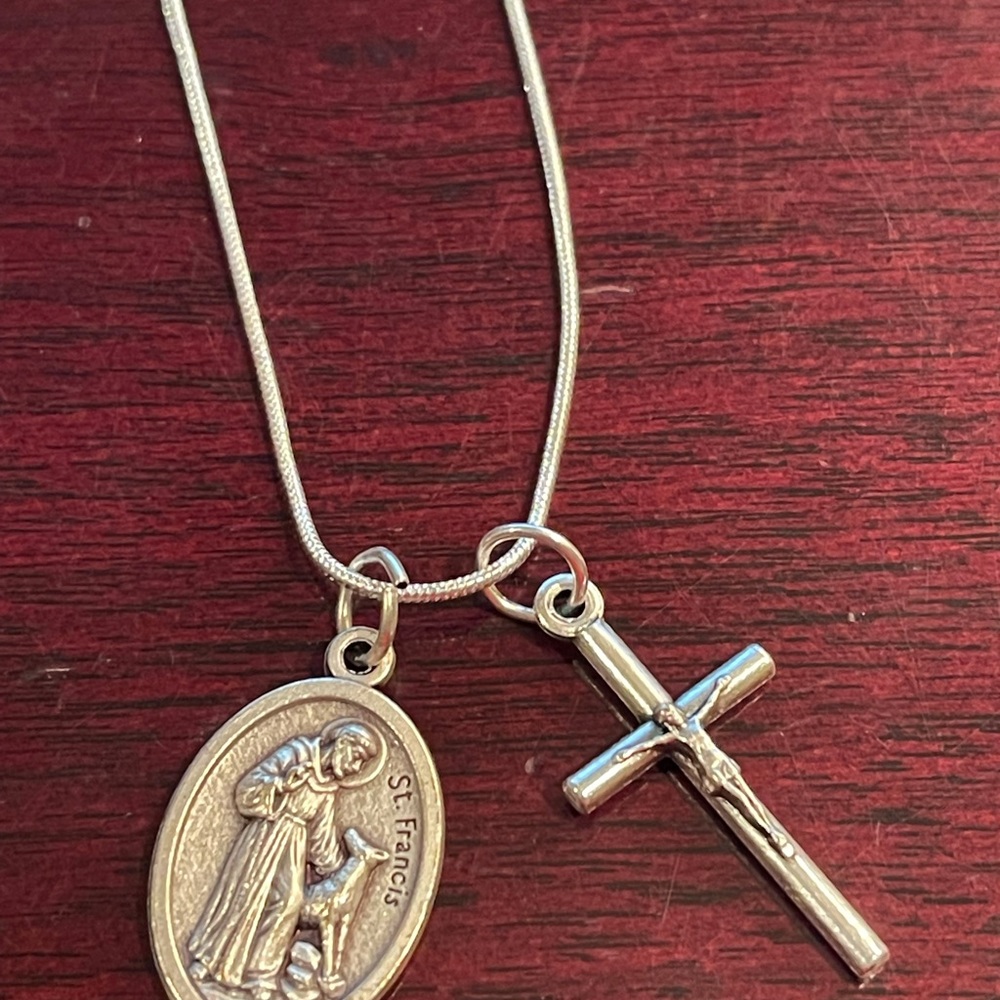 Sterling plated 18” chain with a St. Saint Francis medal and crucifix - Charity.